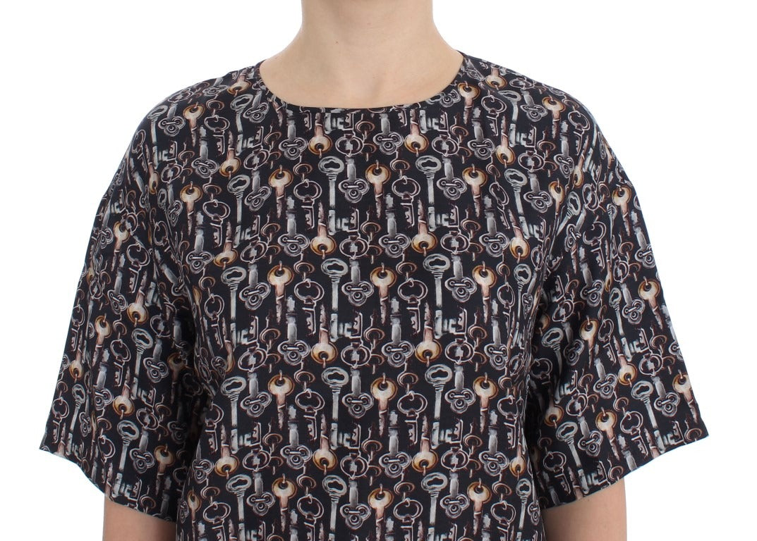 Gray silk blouse with gold key print by Dolce & Gabbana, featuring a stylish T-shirt design with a smooth fabric finish.