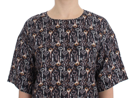 Gray silk blouse with gold key print by Dolce & Gabbana, featuring a stylish T-shirt design with a smooth fabric finish.