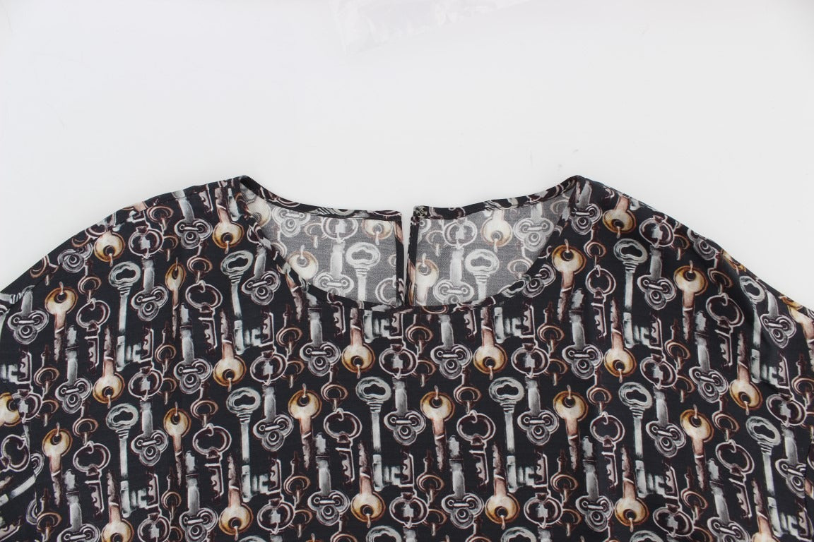 Gray silk blouse with gold key print from Dolce & Gabbana, featuring a stylish T-shirt design and elegant fabric texture.