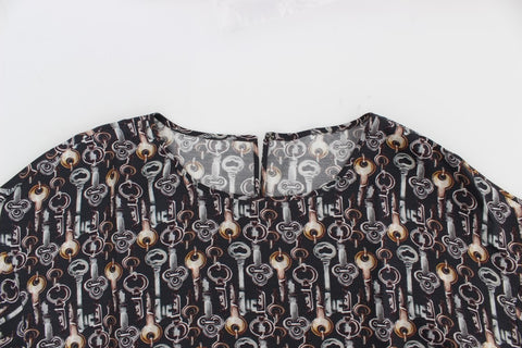 Gray silk blouse with gold key print from Dolce & Gabbana, featuring a stylish T-shirt design and elegant fabric texture.