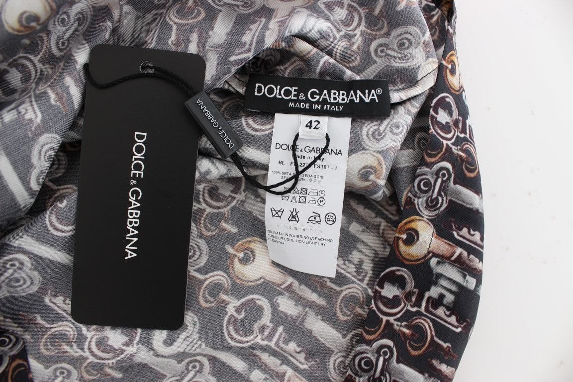 Gray silk blouse with gold key print from Dolce & Gabbana, featuring a stylish T-shirt design and elegant fabric.
