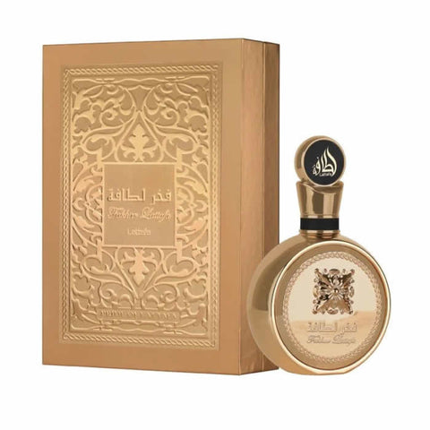 Lattafa Fakhar Gold Extrait EDP spray by Jag Couture London, New York, 100ml bottle with gold accents and elegant packaging.