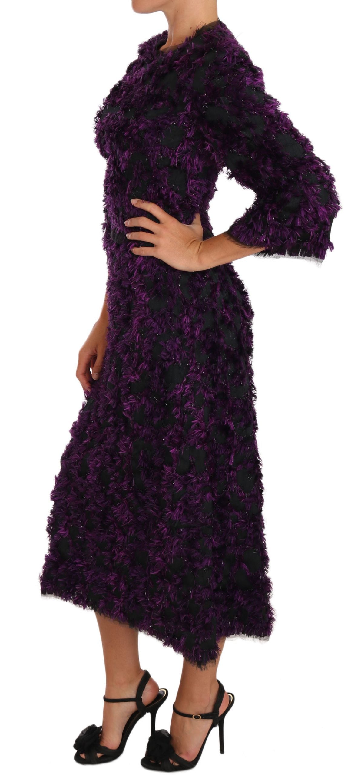 Purple Dolce & Gabbana fringe midi sheath dress with intricate detailing and elegant silhouette, showcased on a model.