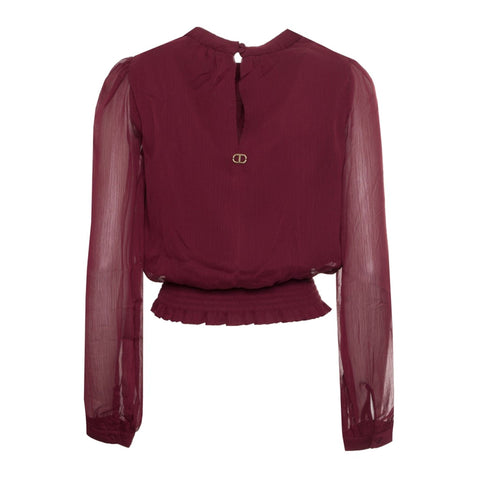 Jag Couture London - New York Twinset X073_222TN2040-_00565, close-up of stylish knit sweater with intricate pattern.
