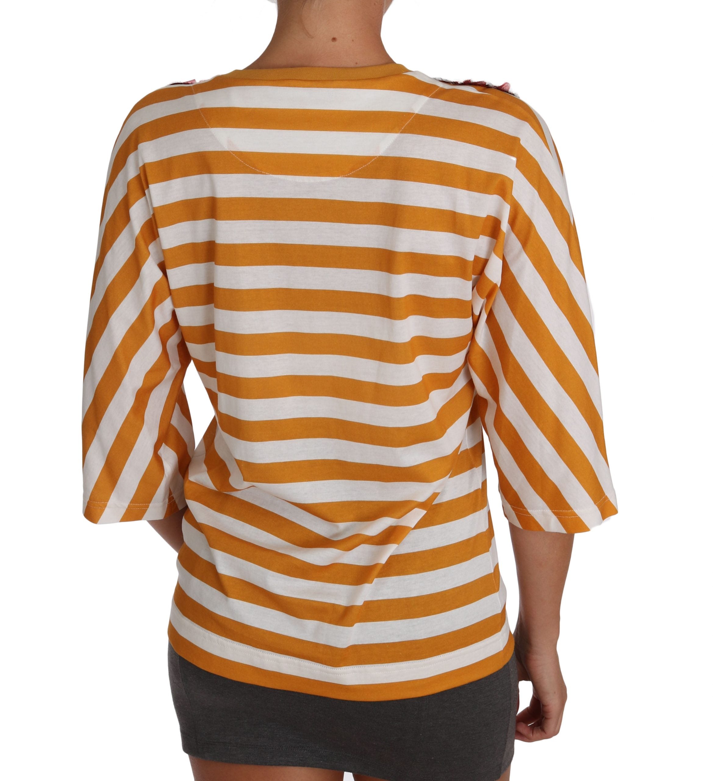 White orange Firenze top T-shirt by Dolce & Gabbana with a stylish design, displayed on a flat surface.