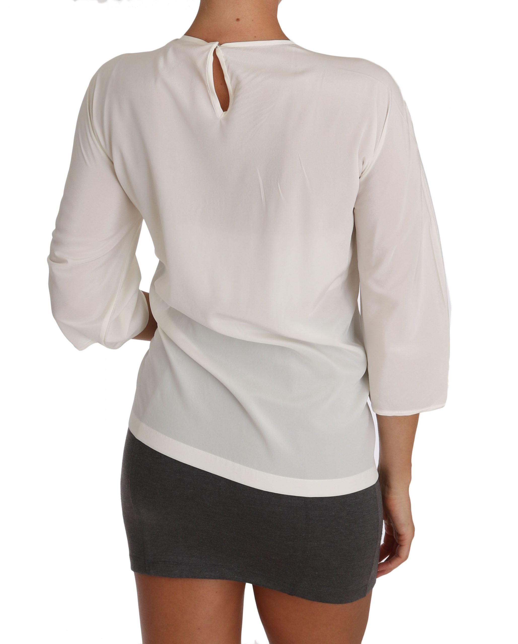White silk blouse T-shirt by Dolce & Gabbana featuring a relaxed fit and elegant design, displayed on a plain background.