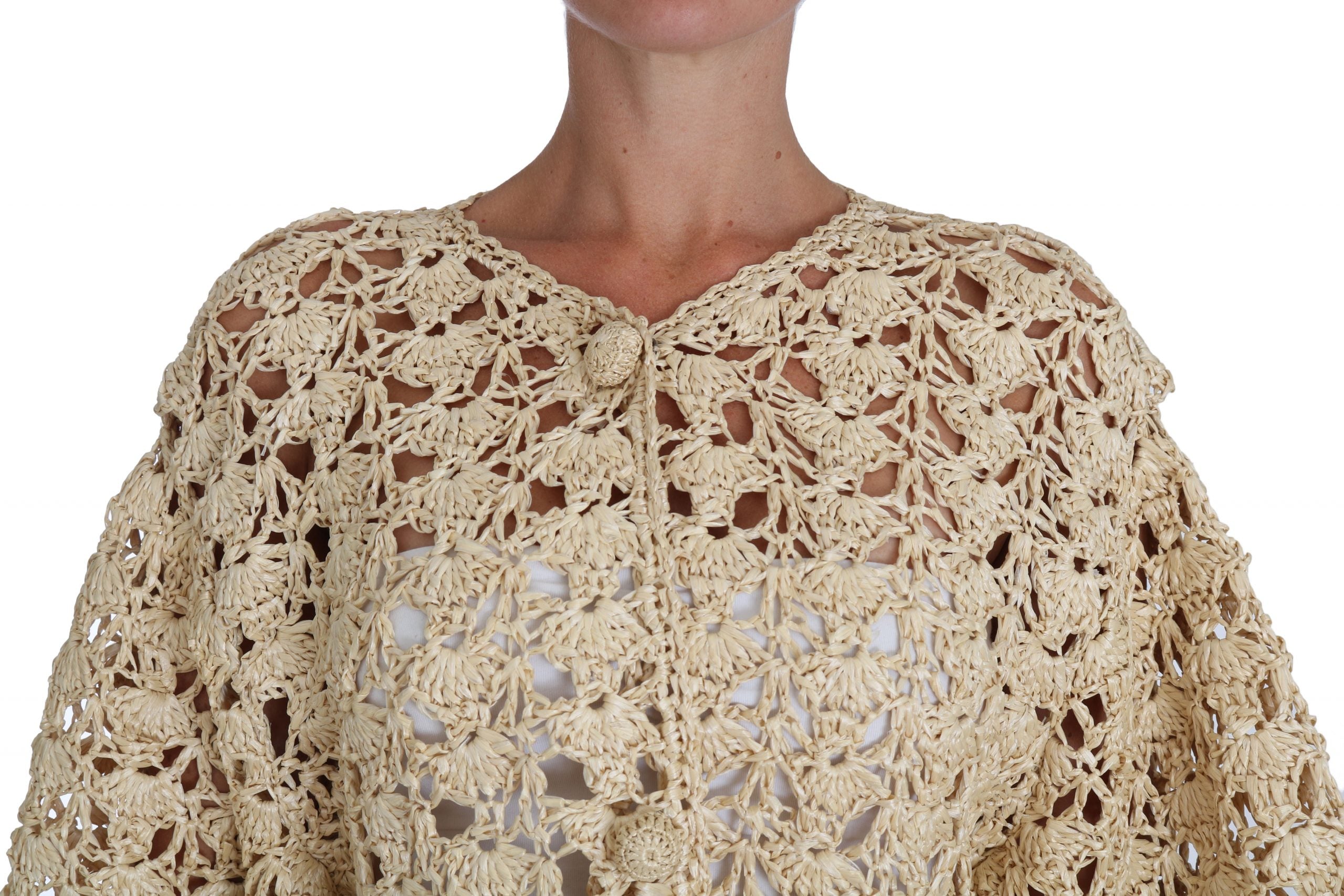 Beige crochet knitted cardigan with raffia accents by Dolce & Gabbana, featuring a relaxed fit and textured knit design.