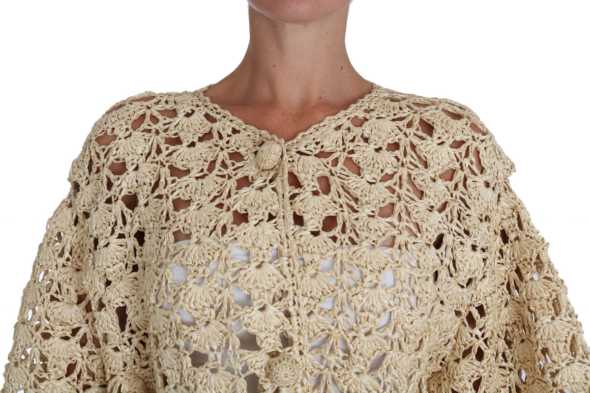 Beige crochet knitted cardigan with raffia accents by Dolce & Gabbana, featuring a relaxed fit and textured knit design.