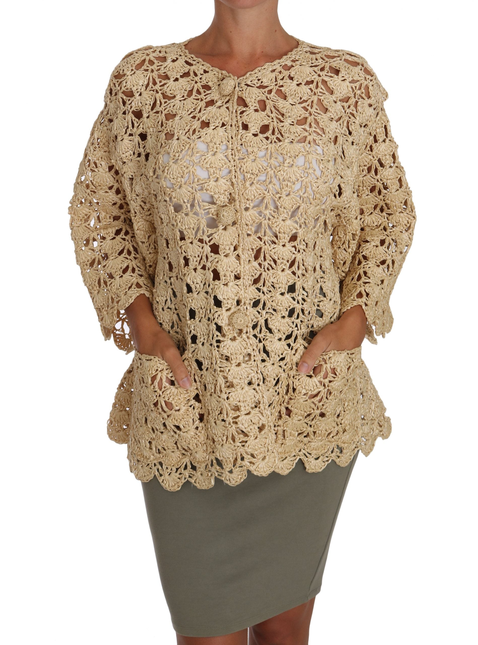 Beige crochet knitted cardigan sweater with raffia accents by Dolce & Gabbana, featuring a textured, stylish design.