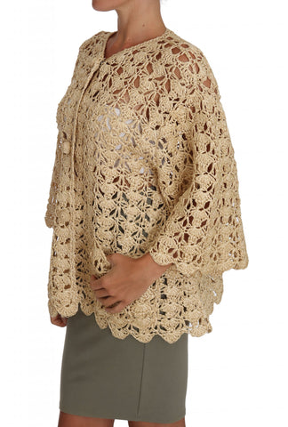 Beige crochet knit cardigan sweater with raffia accents by Dolce & Gabbana, featuring textured knitting and a relaxed fit.