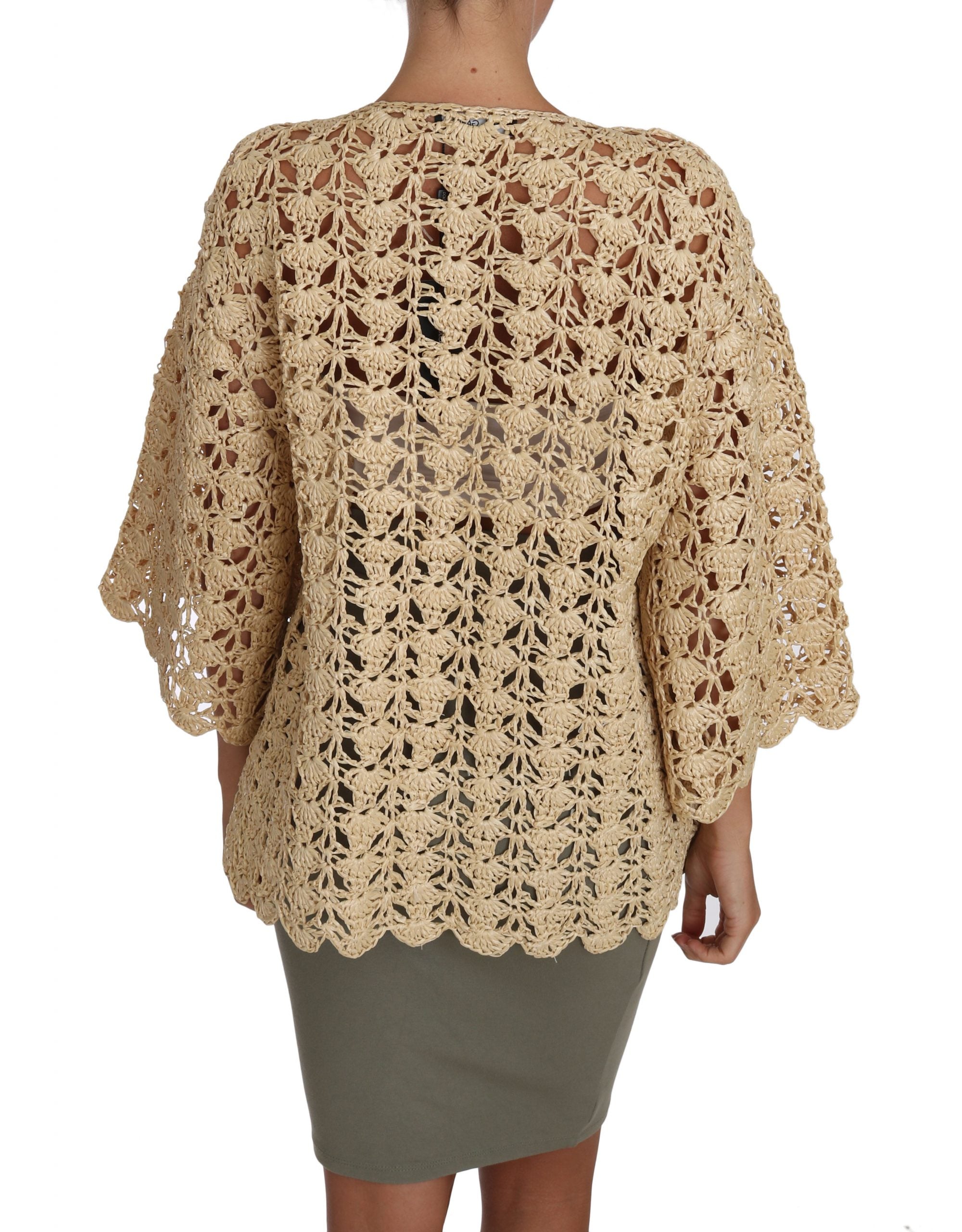 Beige crochet knitted cardigan sweater with raffia accents, Dolce & Gabbana, displayed on a mannequin.
