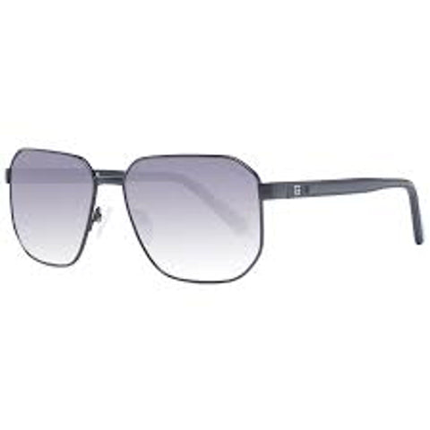 Guess GF5086_02B sunglasses by Jag Couture London-New York featuring black frames and dark tinted lenses.