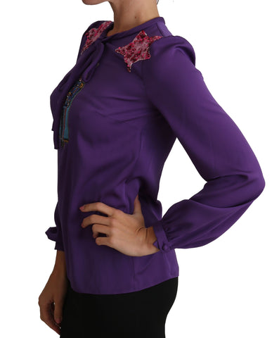 Purple Dolce & Gabbana blouse with fairy tale embellished details, stylish top featuring intricate embroidery and elegant design.