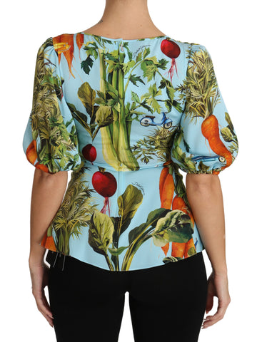 Multicolor vegetable print silk peplum wrap blouse by Dolce & Gabbana, featuring vibrant floral and vegetable motifs.