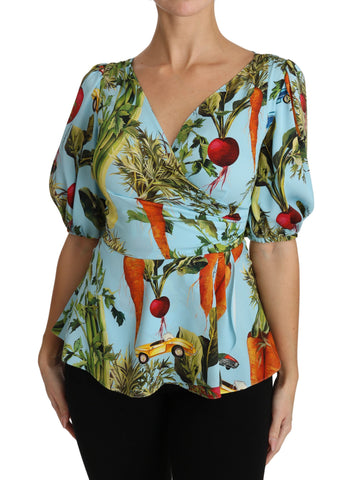 Multicolor vegetable print silk peplum wrap blouse by Dolce & Gabbana, featuring vibrant vegetable motifs and elegant design.