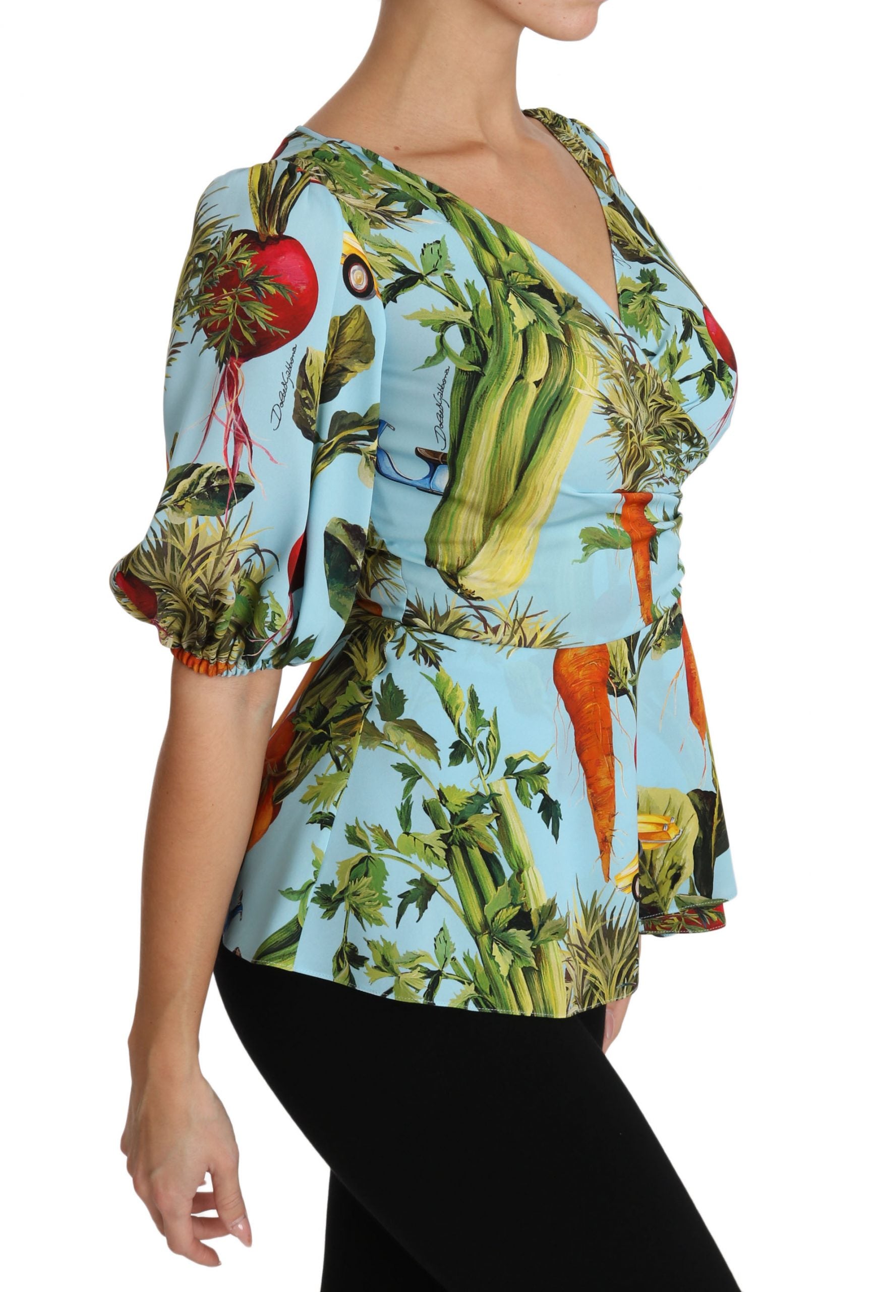 Multicolor vegetable print silk peplum wrap blouse by Dolce & Gabbana, featuring vibrant vegetable patterns and elegant design.