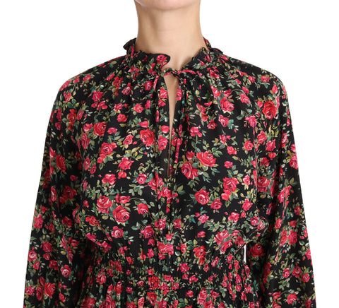 Black floral blouse with rose print from Dolce & Gabbana, featuring a stylish shirt top design and elegant long sleeves.