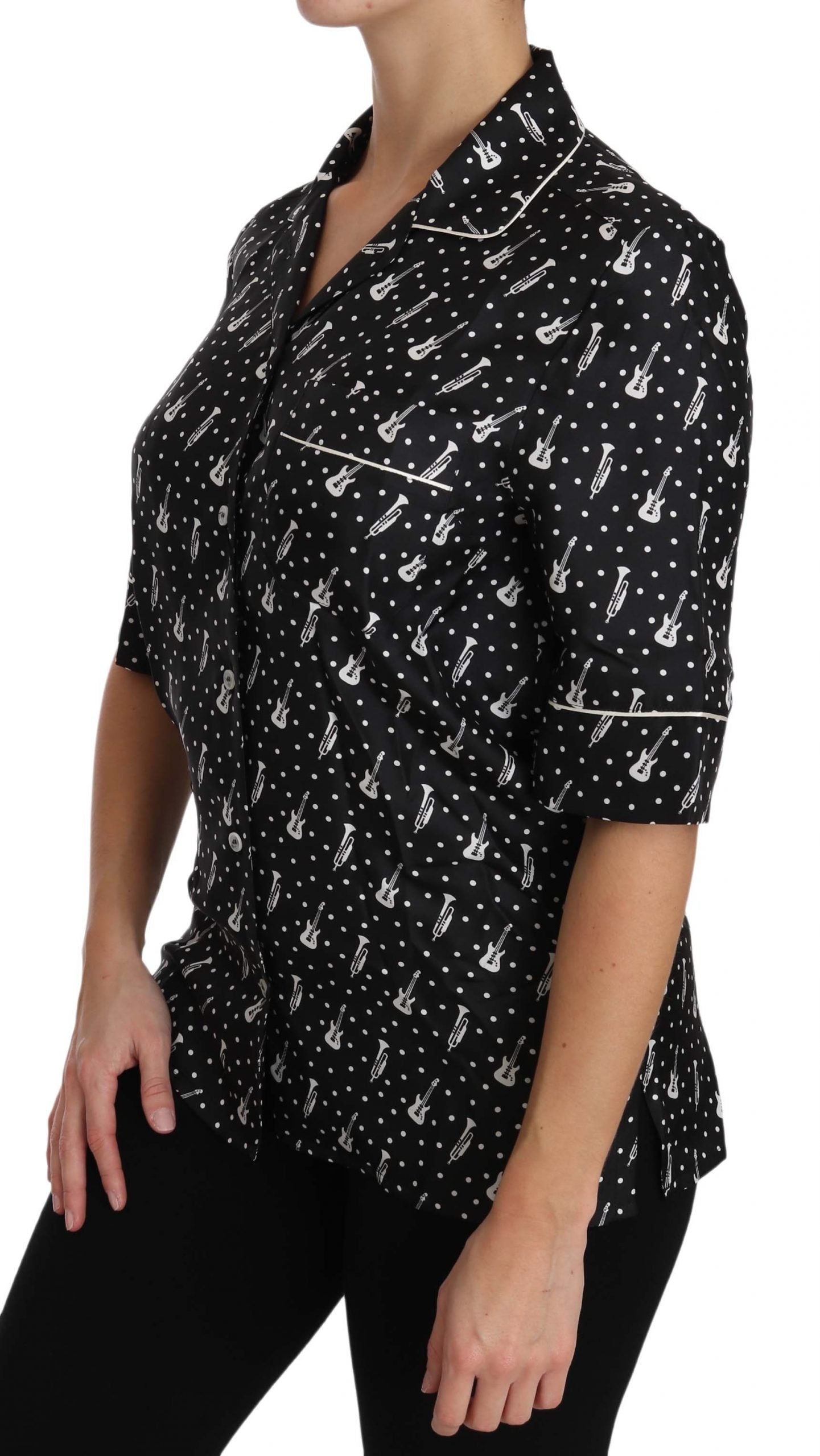 Black silk shirt top with trumpet print from Dolce & Gabbana, showcasing a stylish, patterned long-sleeve design.