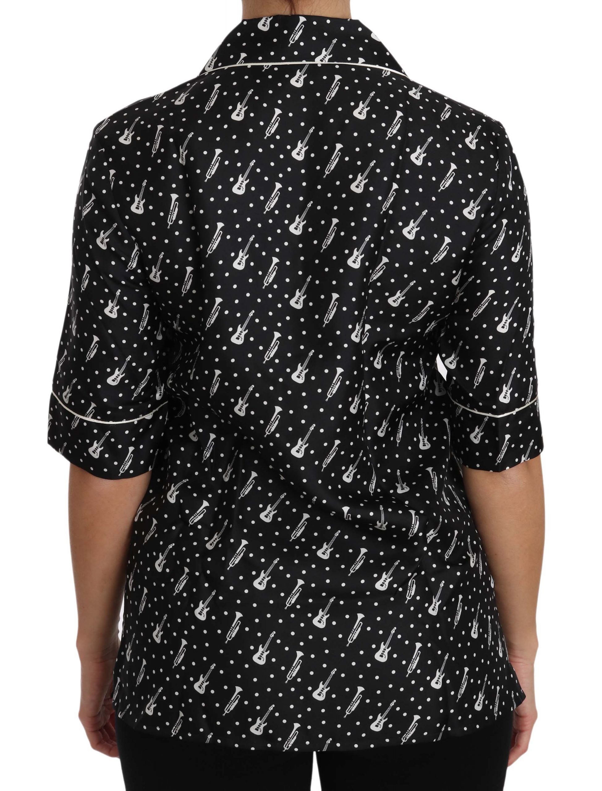 Black silk shirt top with guitar and trumpet print from Dolce & Gabbana, featuring a stylish, lightweight design.