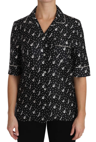 Black silk shirt top with trumpet print by Dolce & Gabbana, featuring a stylish, fitted design and elegant fabric details.