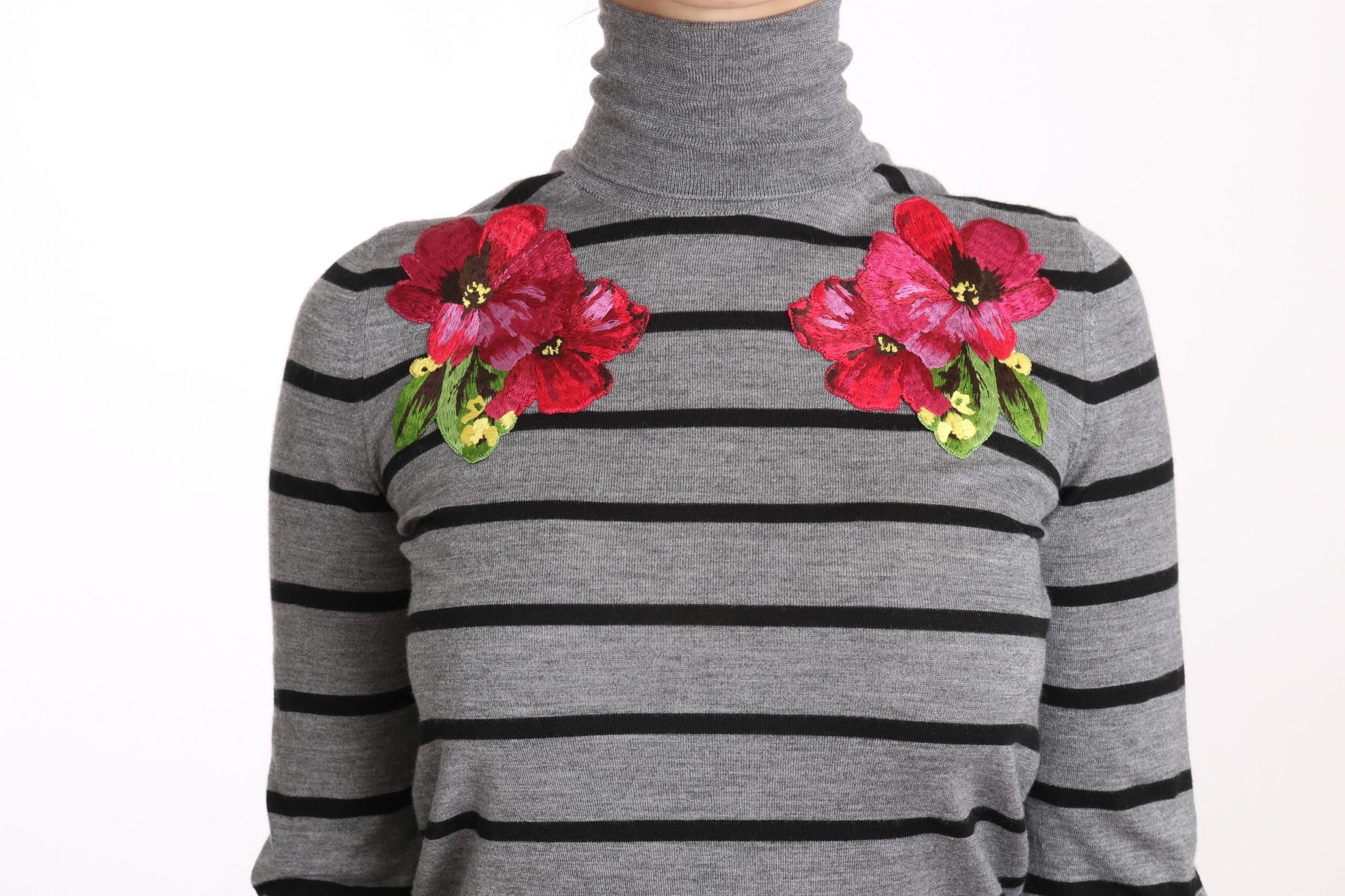 Gray cashmere silk turtleneck sweater by Dolce & Gabbana, close-up showing soft knit fabric and classic turtleneck design.