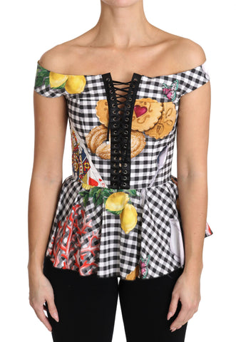 Black and white corset blouse with Sicily lemon check pattern from Dolce & Gabbana, featuring a fitted, stylish top with ruffled details.