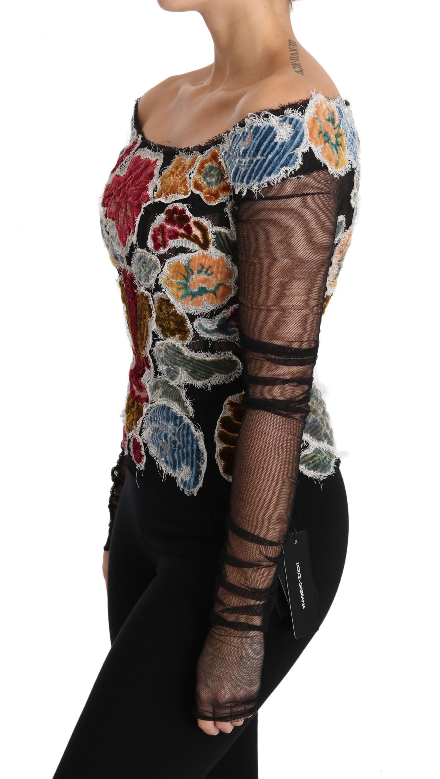 Black floral Ricamo top T-shirt blouse by Dolce & Gabbana with embroidered floral design and relaxed fit, shown on a white background.
