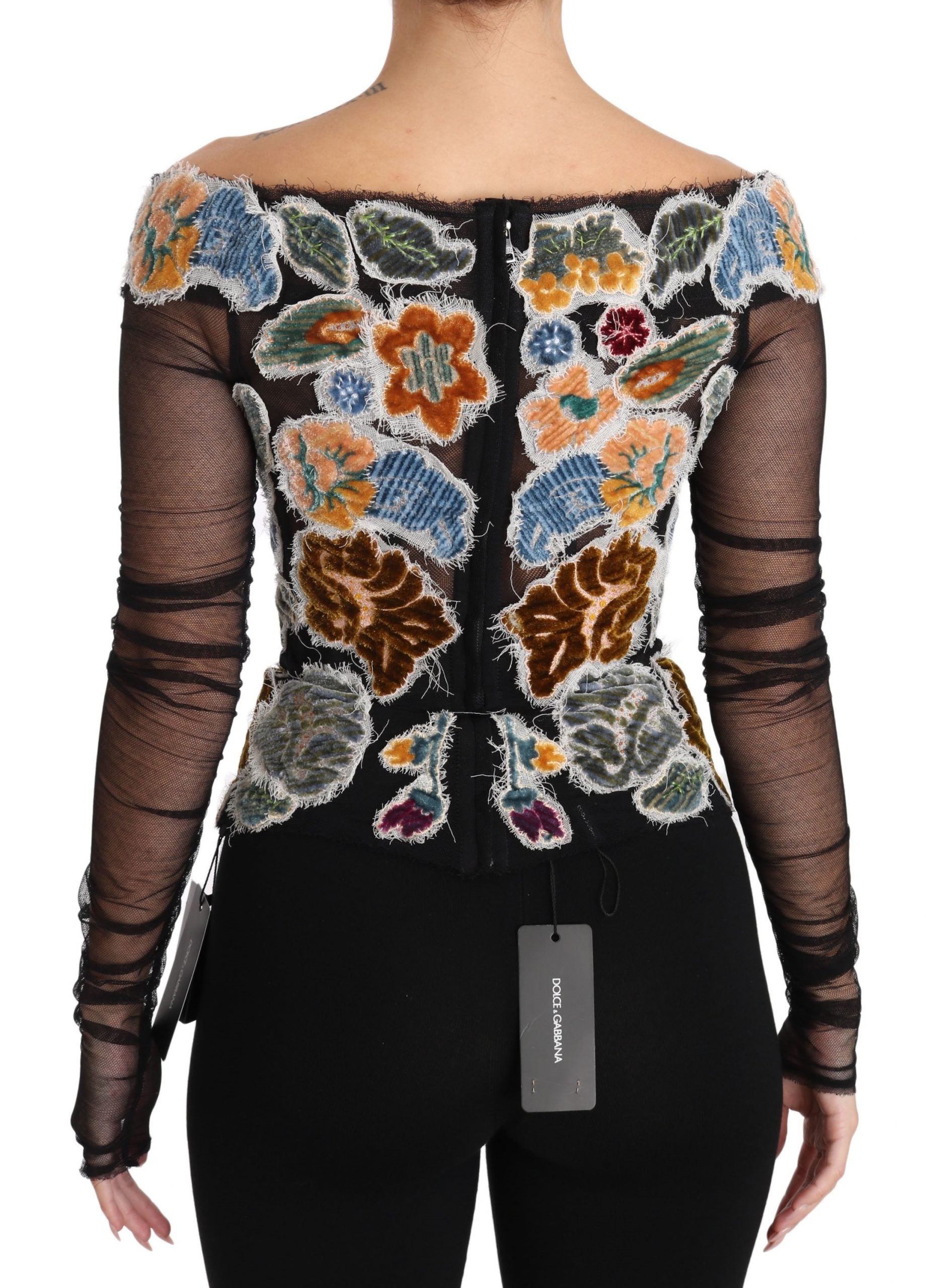 Black floral Ricamo top T-shirt blouse by Dolce & Gabbana with intricate embroidery and a relaxed fit.