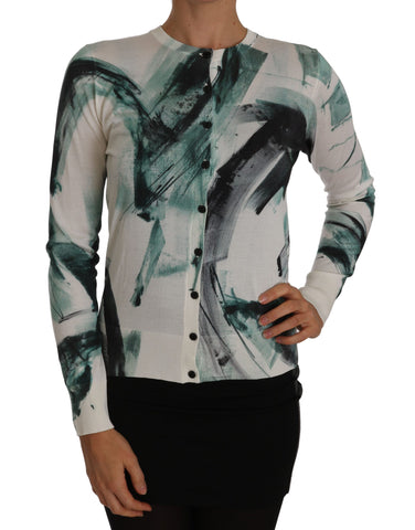 White silk cardigan with lightweight paint stroke pattern by Dolce & Gabbana, shown on a model.