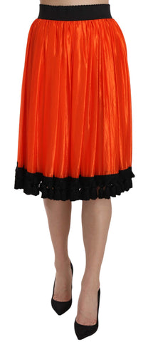 Orange high waist knee-length skirt by Dolce & Gabbana, styled with a fitted waistband and classic silhouette.