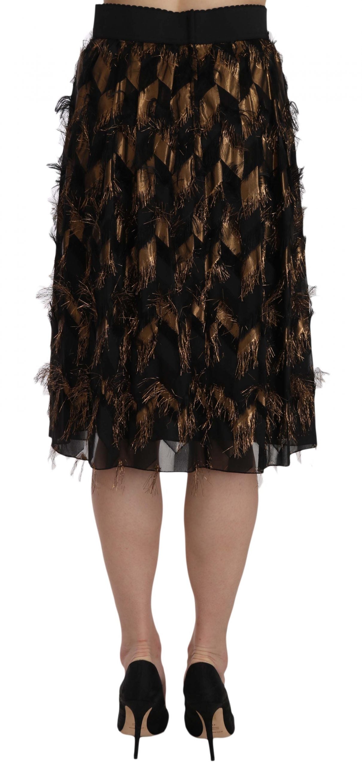 Black gold fringe metallic pencil A-line skirt from Dolce & Gabbana, featuring shiny fabric and stylish fringe details.