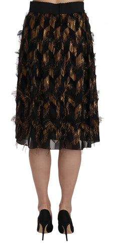 Black gold fringe metallic pencil A-line skirt from Dolce & Gabbana, featuring shiny fabric and stylish fringe details.