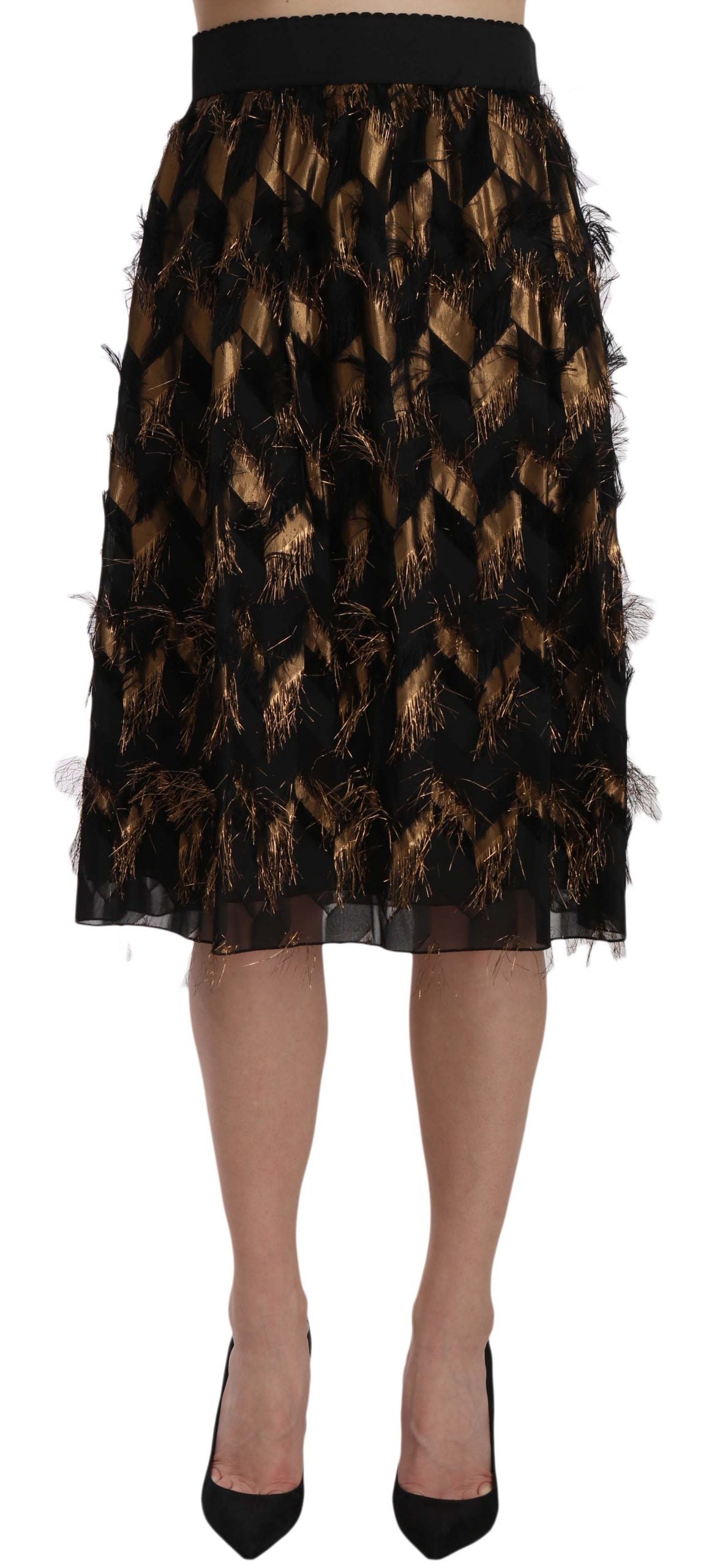 Black gold fringe metallic pencil A-line skirt by Dolce & Gabbana, featuring shiny gold accents and a fitted silhouette.