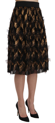 Black gold fringe metallic pencil A-line skirt by Dolce & Gabbana, featuring shiny fringe detail and a sleek silhouette.