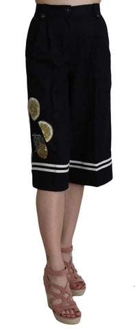 Black cotton cropped pants with embellishments from Dolce & Gabbana, featuring detailed embroidery and a stylish, modern fit.