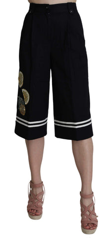 Black cotton cropped embellished pants by Dolce & Gabbana with decorative details and a relaxed fit.