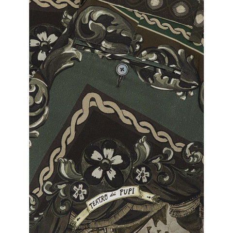 Green cotton casual pants by Dolce & Gabbana, featuring a relaxed fit and stylish design, shown in the product image.