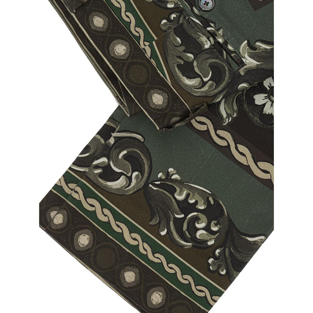Green cotton casual pants by Dolce & Gabbana, showing relaxed fit and stylish design on a model.
