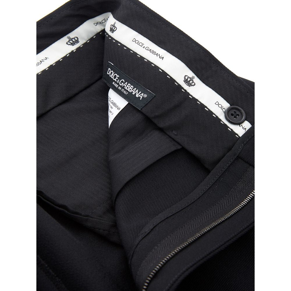 Black polyester dress pants by Dolce & Gabbana, tailored fit with classic waistband and sleek front design.