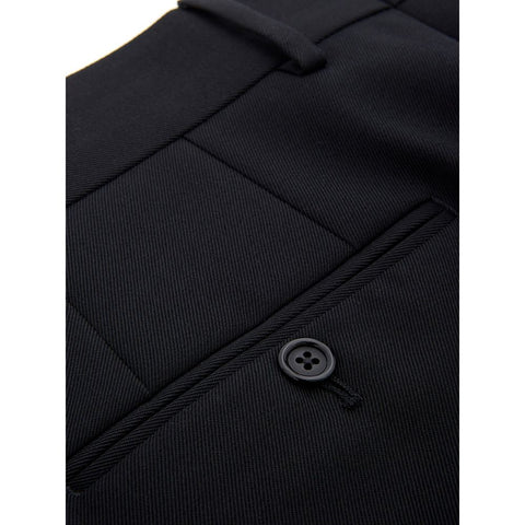 Black polyester dress pants by Dolce & Gabbana, tailored fit with sleek waistband and classic styling, shown on a plain background.