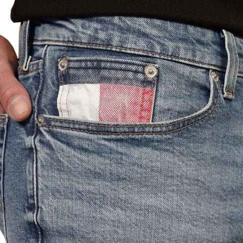 Tommy Hilfiger x Jag Couture London New York shirt featuring classic design and branded logo, displayed on a hanger.