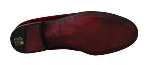 Bordeaux velvet loafers with gunmetal horseshoe embellishments from Dolce & Gabbana, shown with a close-up of the detailed design.