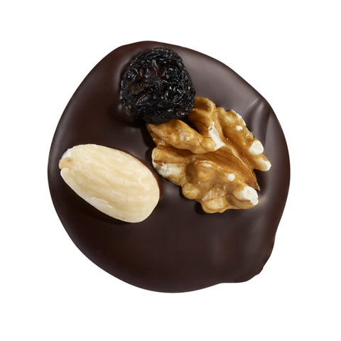 Dark Mendiant by Jag Couture London features a dark chocolate disc topped with nuts and raisins, 14g.
