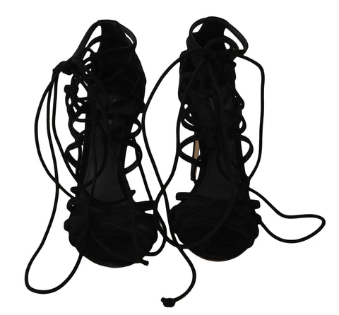 Black suede strap stilettos sandals by Dolce & Gabbana with sleek high heels and elegant design.