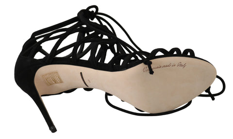 Black suede strap stiletto sandals by Dolce & Gabbana with high heels and sleek design.