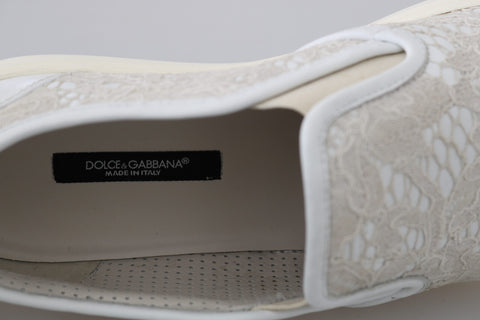 White leather lace slip-on loafers shoes by Dolce & Gabbana displayed on a plain background.