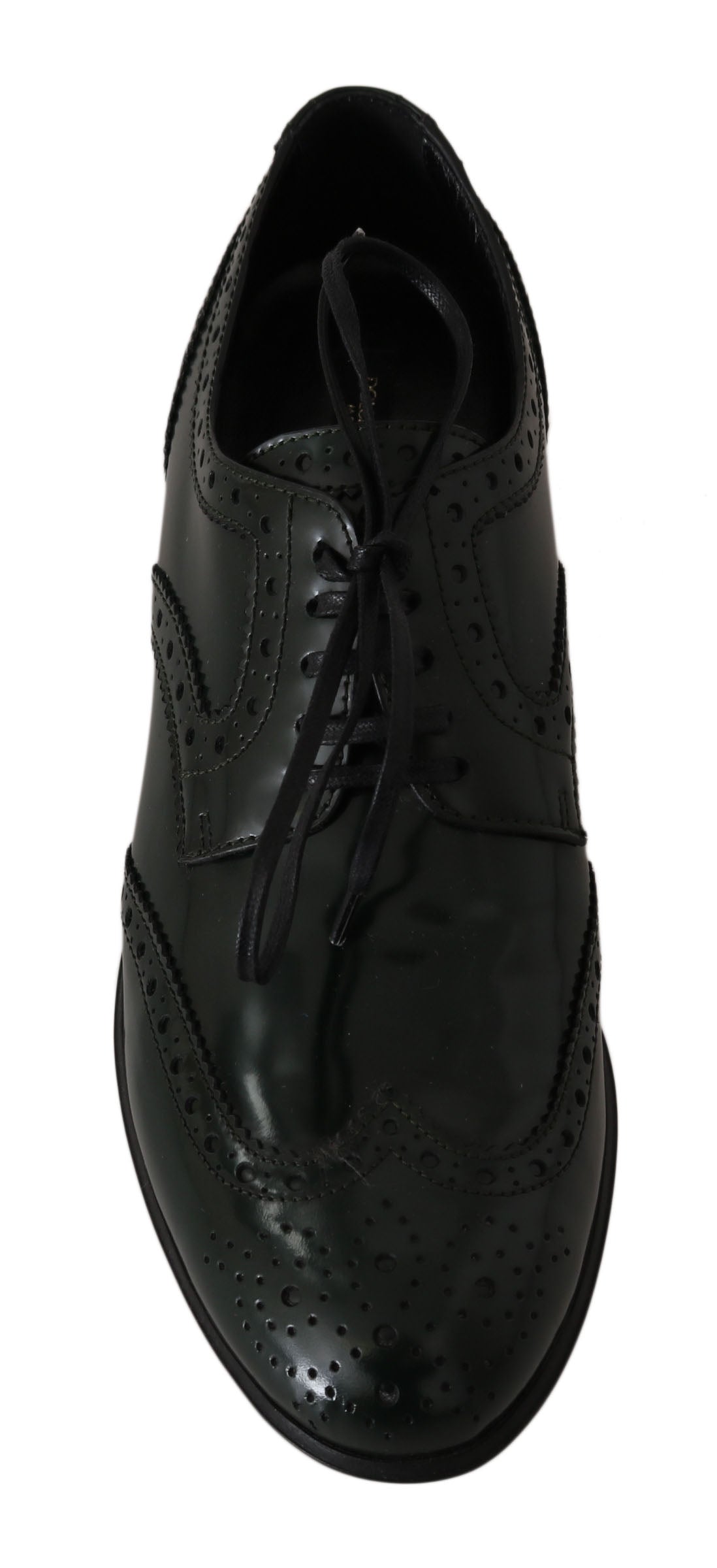 Green leather brogue oxford wingtip shoes by Dolce & Gabbana, featuring detailed wingtip design and classic lace-up style.