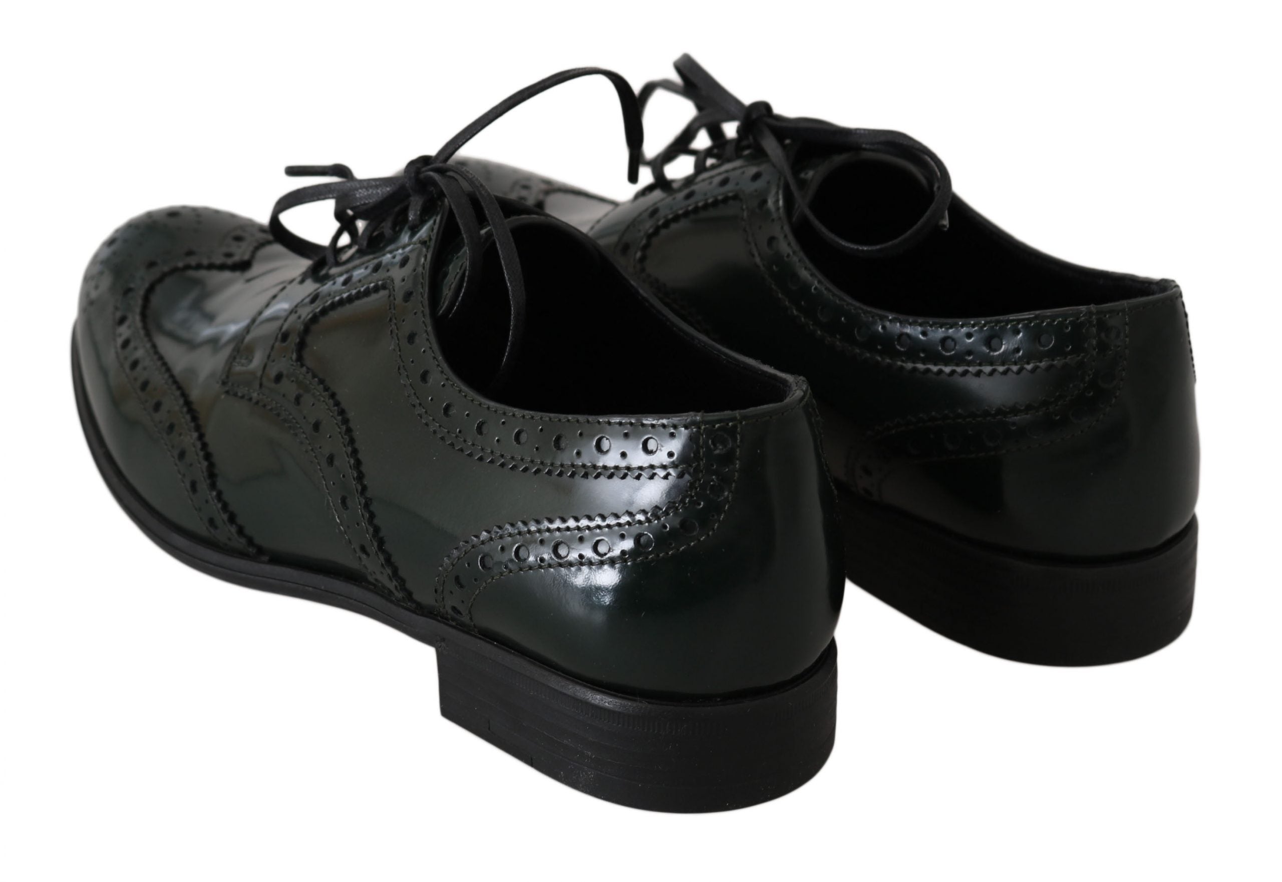 Green leather brogue oxford wingtip shoes by Dolce & Gabbana, showing detailed wingtip design and polished leather finish.