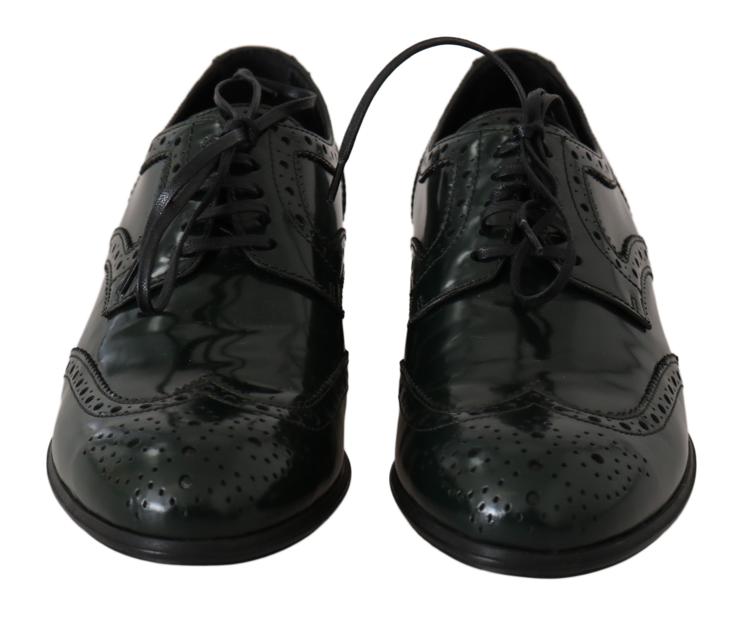 Green leather brogue Oxford wingtip shoes by Dolce & Gabbana, featuring detailed wingtip design and classic lace-up style.