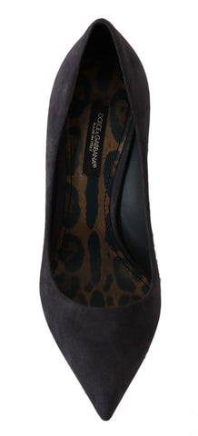 Gray suede leather Dolce & Gabbana stiletto heels with pointed toes and sleek design.